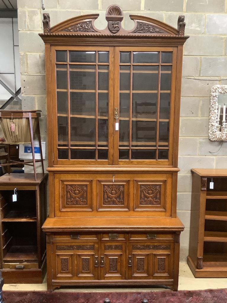 A large Victorian oak secretaire bookcase, width 144cm, depth 61cm, height 290cm, believed to originate from the Hull area having belonged to a member of the Strachan family